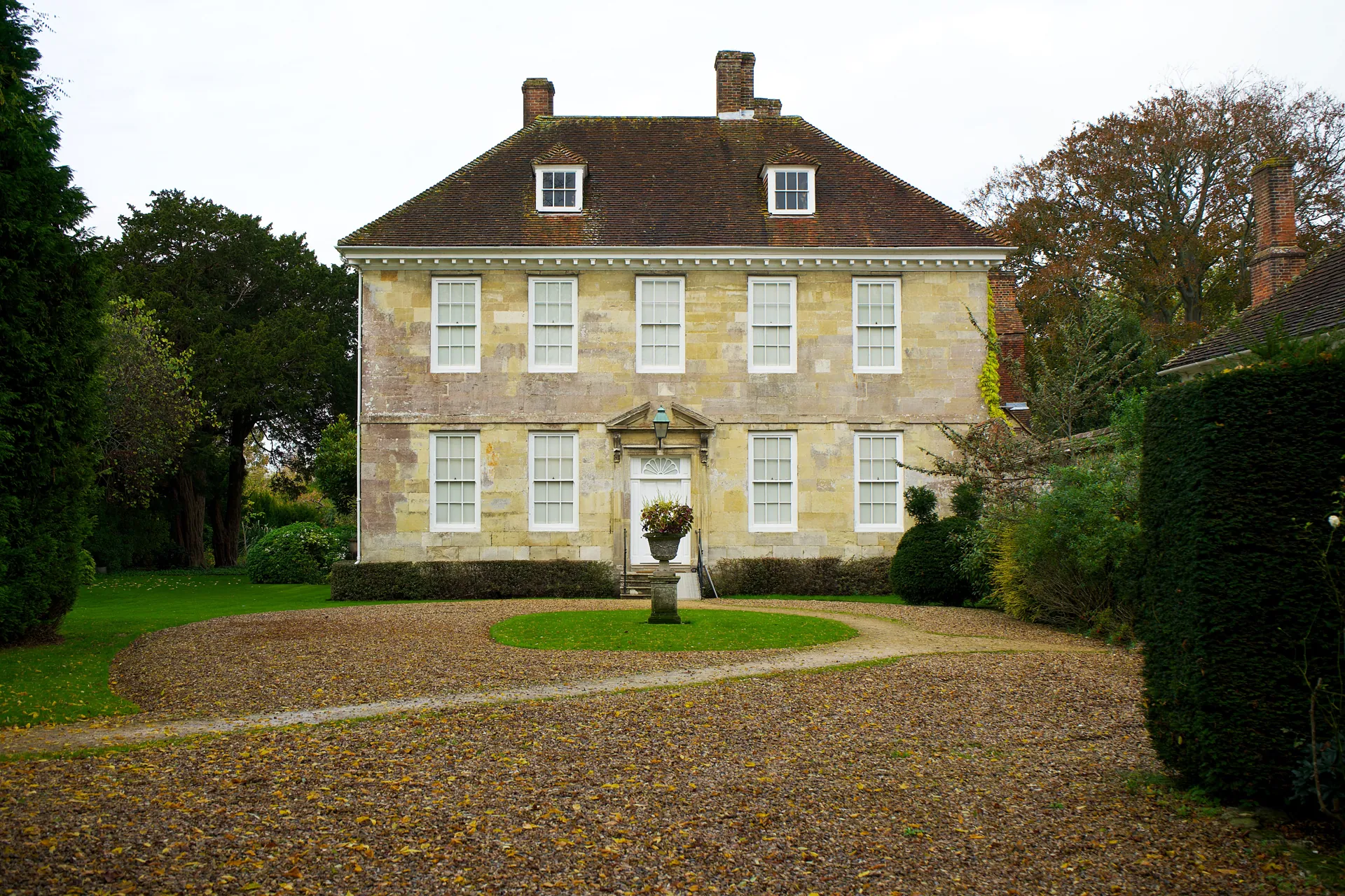 Manor house with gravel drive