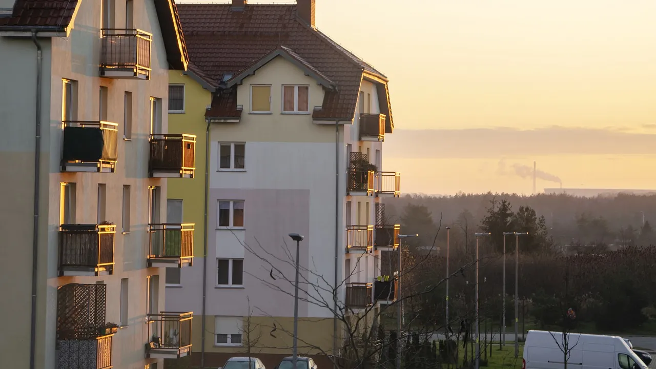 Residential complex with several apartment buildings in the evening
